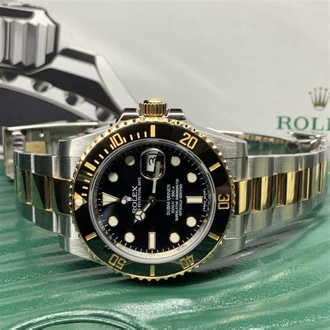 rolex submariner yellow gold price.